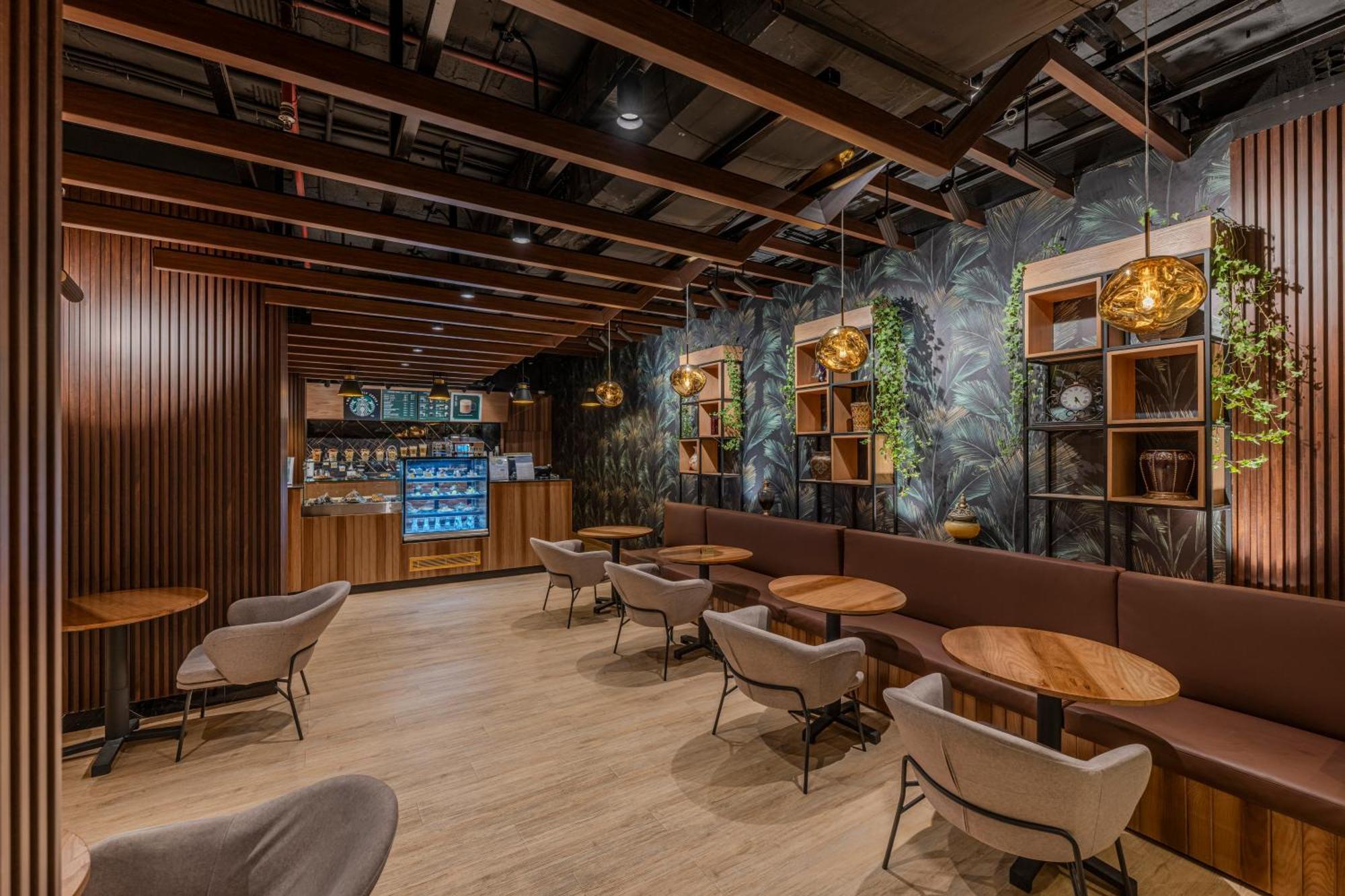 Al Shohada By Palm Rich Makkah Hotel Mekka Eksteriør billede Interior of a Starbucks Reserve store in Shanghai, China